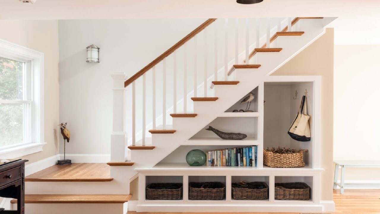 interior design form, a set of wide stairs with a unique detail and a under stairs cupboard with a range of shapes 